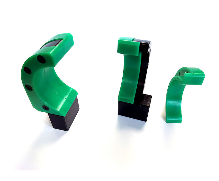 Manipulación robótica de piezas redondas Diseño de garras especiales para manipulación de piezas redondas